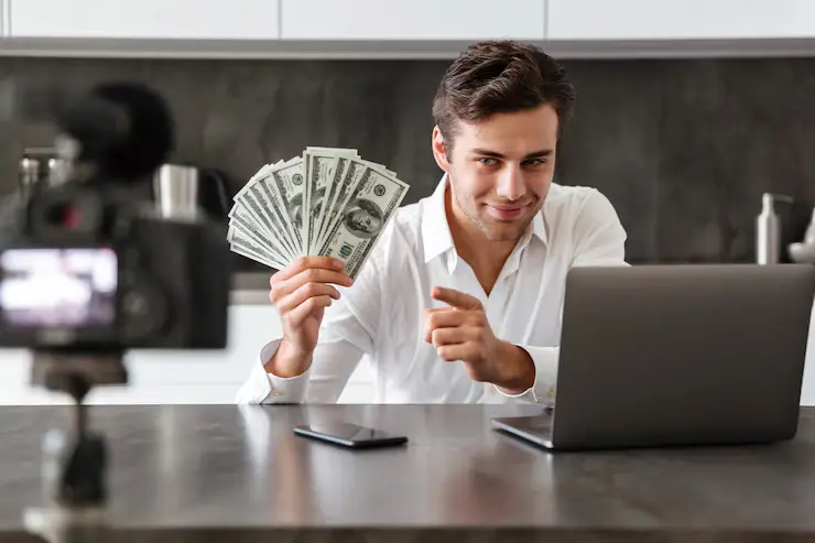 Best Passive Income Ideas in 2026 showing a person managing multiple online income streams including affiliate marketing, digital products, stock investments, and AI automation dashboards in a modern workspace.